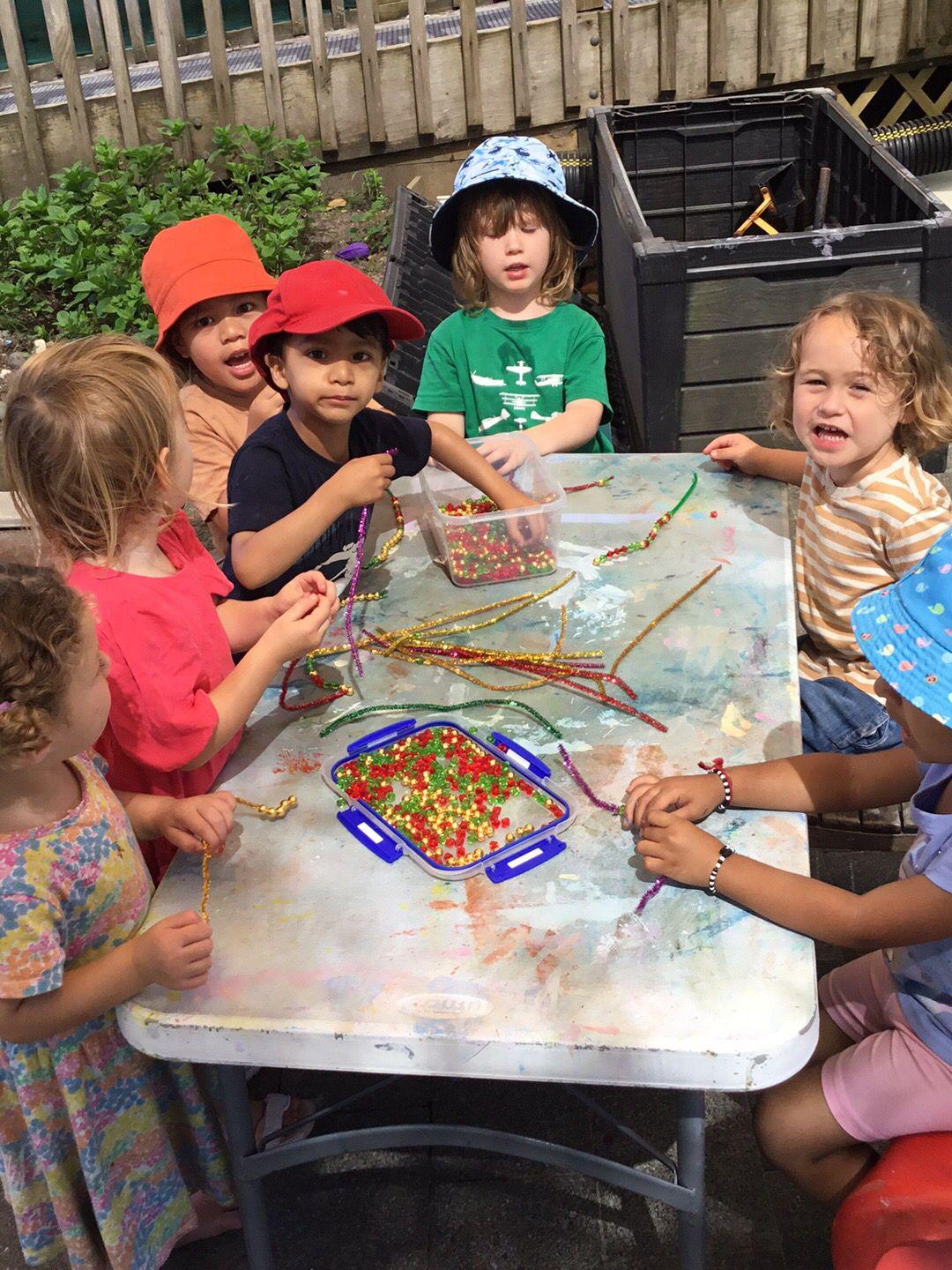 Children learning and playing at Little Village Preschool